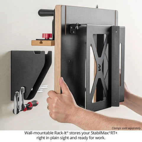 USA Made Portable Benchtop Router Table With Straight Up Precision Fence shown mounted on wall with wood clamp storage.