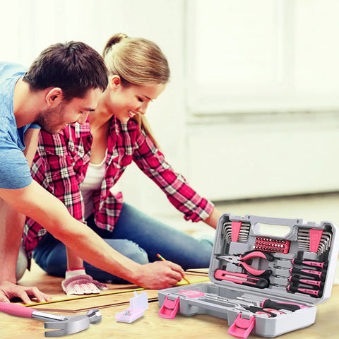 Pink 150 Piece All Purpose Tool Kit In Tool Box Storage Case For DIY Home Repairs And Projects Perfect For Garage Office Dorm And College Use Women Ladies And Girls in use on wood floor project with couple
