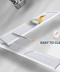 32 By 84 Inch White Barn Door With Five And A Half Foot Sliding Door Hardware Kit Included And Handle Solid Wood Covered With Waterproof PVC Surface Easy DIY Assembly And Install H Frame Fits Twenty Eight To Thirty Inch Wide Opening, shown with paintbrush, demonstrating easy cleaning.