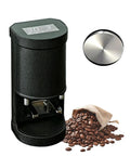 Automatic Digital Coffee Tamper Machine For Home Baristas With Touch Screen Dashboard And Adjustable Five To Thirty Kilogram Settings For Hella Consistent Espresso Shots, black finish, with coffee beans.