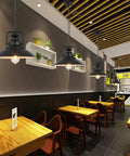 Old School Vintage Inspired Round Black Industrial Pendant Light With E27 Socket Wrought Iron Lampshade in a restaurant setting