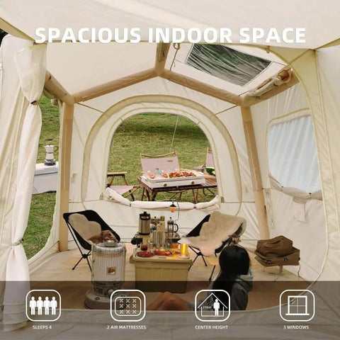 Interior of spacious Quick Setup Camping Tent With Air Beams For Easy Outdoor Shelter No Poles To Mess With All Season Waterproof 210D Oxford Fabric Dual Action Pump Included For Fast Setup In Under 5 Minutes showing living space with chairs and table.