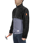 Heavy Duty Welding Cape Sleeve Made From Tough Split Cowhide Leather Flame Resistant Welder Jacket worn by man holding a hammer.
