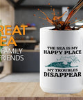 Sailor Themed 15oz White Coffee Mug for Boaters and Mariners on a wooden table with coffee spill, perfect for sea lovers and sailors.