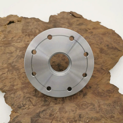 Heavy Duty 3 Inch Wood Lathe Steel Faceplate With 1-8 TPI Thread, Eight Mounting Holes on wood surface