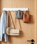 Premium Heavy Duty Self Adhesive Coat Rack Wall Mount Featuring Seven Robust Hooks For A Total Breeze Entryway Organization Dorm Room Key Holder Storage Rack with bags and a hat