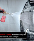 Person using Foam Cannon For Pressure Washer With M22 And 1 Quarter Inch Quick Connect on car, spraying thick foam