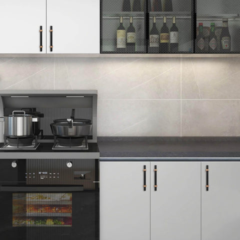 Five Inch Knurled Cabinet Pulls In Matte Black And Champagne Bronze For Kitchen Cabinets And Furniture by KOMOTIA, installed on white cabinets