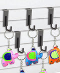 Heavy Duty Slatwall Hooks Built Like A Tank With Slick Scratch Resistant Coating showcasing colorful keychains on a slatwall.