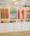 Total Glow Up For Your Space With Massive Freestanding Modular Closet System Featuring Solid Wood Drawers Hanging Rods And Shelves In White For Effortless Clutter Crushing. Freestanding closet with dresses, drawers, and accessories.