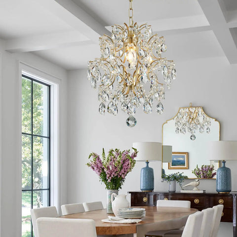 Top Tier Gold Crystal Raindrop Pendant Chandelier Featuring Durable Glass Tubes And Adjustable Chain Ceiling Light E26 Socket in dining room.
