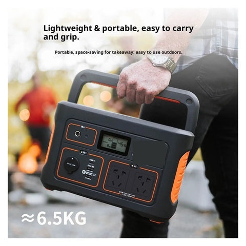 Off Grid Wind Generator And Portable Power Station For Camping RV Home Backup Solar Ready Heavy Duty rugged case held in hand.