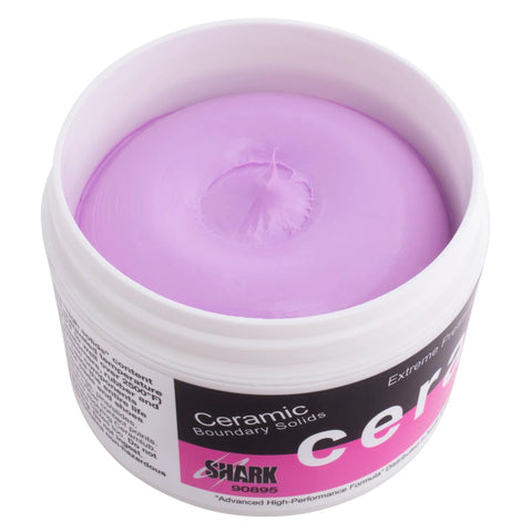 Shark Ceramlub ceramic brake lubricant paste in an open white jar with purple paste
