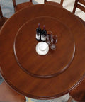 Premium Heavy Duty Lazy Susan Rotating Turntable Serving Tray For Kitchen Counters And Backyard Bashes, shown on wooden table with bottles and glasses.