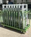 Rock Solid Shop Beast Steel Cart For Hauling Sheet Metal Plastic Glass And Wood Panels With Scratch Free Multi Slot Rack System And No Sweat Smooth Roll Wheels, holding stacked panels securely.