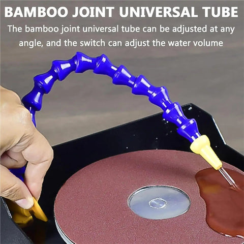 Bamboo joint universal tube attached to rugged benchtop electric sander for water cooling adjustment during sharpening.