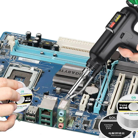 80W All In One Soldering Iron And Soldering Gun Kit With Ceramic Heater 10 In 1 Auto Soldering Set in use on motherboard
