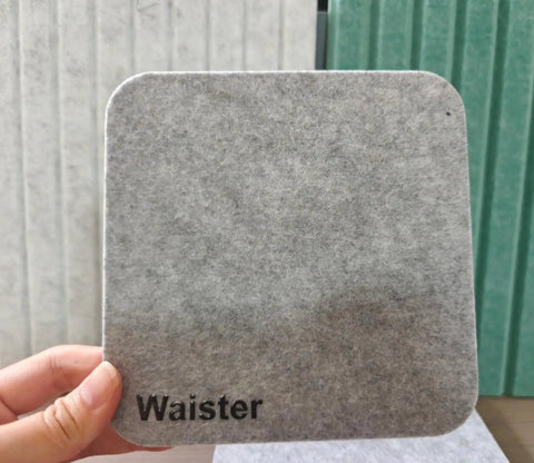 Snag This 4 Pack Of Polyester Fiber Acoustic Panels Self Adhesive Sound Proof Tiles 0.4 Inch Thick gray acoustic panel with rounded corners.
