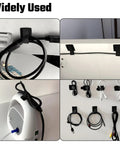 Adjustable Reusable Cable Management Kit 40 Pcs Pro Grade With 3 Inch Straps used for organizing cables on desk and devices.