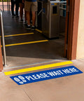 Five Piece Please Wait Here Floor Sign Kit 26 By 6 Inches Self Adhesive Waterproof Vinyl, Durable Social Distancing Markers For Queues And Waiting Areas, Multipack Signage For Busy Shops. Blue floor sign by entrance marking queue space