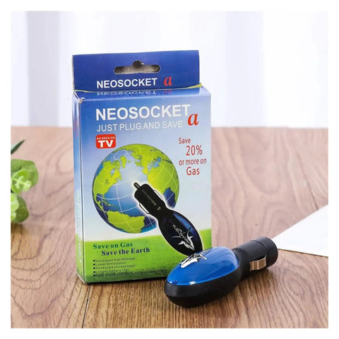 Gas Saver Plug In For Cars Trucks And Diesel Vehicles That Lets You Go Further And Save More Fuel Instantly With No Tool Setup In The Cigarette Lighter, Boosts Engine Power And Throttle Response With Every Ride, product box and device on table.