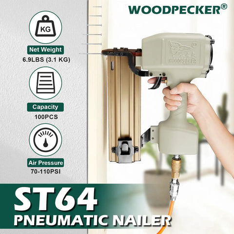 St64 14 Gauge Pneumatic Concrete T Nailer with 400 Concrete T Nails being held, showcasing die-cast aluminum body and design.
