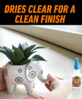Person using Ultimate Clear Super Glue 15 Grams Heavy Duty Fast Set Bond For Quick Fixes And Home Repairs With Anti Clog Cap
