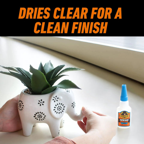 Person using Ultimate Clear Super Glue 15 Grams Heavy Duty Fast Set Bond For Quick Fixes And Home Repairs With Anti Clog Cap