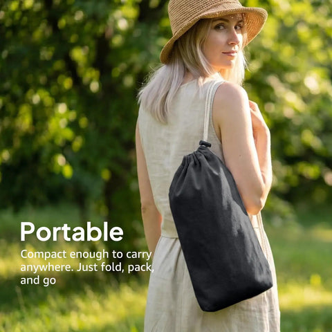 Woman carrying Cotton Portable Camping Hammock With Tree Straps Up To 660 Lbs Travel Bag in park setting