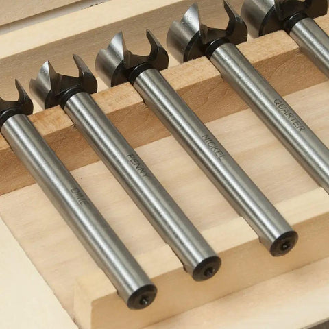 Top Shelf High Speed Steel Forstner Bit Set With Adjustable Depth Stop Collar For Smooth Drilling On Coin Sizes Penny Nickel Dime Quarter Half Dollar And DIY Household Projects showcasing six HSS bits labeled by coin size.