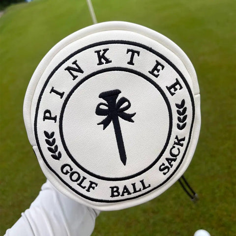 White leather golf valuables pouch with drawstrings, embroidered with graphic and words 'Pink Tee Golf Ball Sack'
