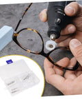 Person using a tool on eyeglasses with Eyeglass Repair Kit Three Set With Nose Pads Screws And Ear Grips For Quick Fixes And Easy Accessories Storage visible in the corner