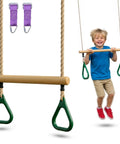 Kids Trapeze Bar With 18 Inch Adjustable Height And Gym Rings For Swing Sets Ninja Warrior Obstacle Course Jungle Gym Playground Attachments Durable Easy Install Backyard Fun showing boy swinging on bar with green rings.