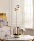 2 Light Plug In Globe Wall Sconce With Smoky Gray Glass Shade And Brass Finish Delivers A Cozy Vibe And Soft Glow For Bathroom Bedroom Hallway Corridor Modern Bedside Lighting