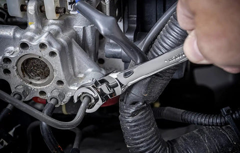 Using Six Piece Flex Flare Nut Wrench Set Metric With 180 Degree Flexible Head on automotive engine line