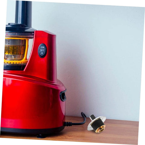 Stainless Steel Juicer Drive Coupling Replacement Part Easy Install Durable Juicer Coupler For Most Juicers Keeps Performance Strong And Efficiency High Kitchen Grade Replacement Accessory next to a red juicer.