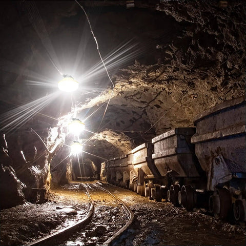 Industrial Grade Construction String Lights LED For Job Sites Renovations Extendable 200 Foot Portable Lighting With Hooks installed in a mining tunnel.