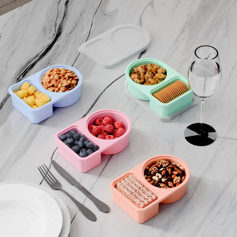 Five Pack Silicone Snack Containers With Two Compartments And Lids 8 Oz Capacity Rainbow Set For Portion Control on table