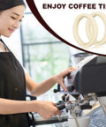 Barista using espresso machine with 54mm silicone steam ring for espresso machines barista grade grouphead gasket replacement visible