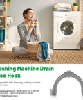 Universal U Shaped Drain Hose Hook For Washer, Dishwasher And Sink Hoses Easy Install U Bend Hose Holder For Secure No Fuss Mount Fits Most Brands Including Samsung And GE. Grey plastic washer drain hose hook, U-shaped, shown with Samsung-compatible drain hose use.