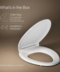 Top Shelf Elongated Toilet Seat With Silent Shut Lids And Seats, No Sweat Grip Tight Mounting Hardware For Easy Swap, ReadyLatch Positive Lock Mechanism, Nightlight Ready Option In Pristine White, partially opened seat.