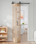 Double 18x84 Inch Bifold French Glass Door Kit With 3.3 Ft Hardware Track in spruce wood framing installed in room.
