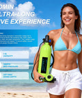 Smiling woman on beach holding 1.9L Mini Scuba Tank 1.9L Portable Lung Tank For Adult Divers, Dope Underwater Entertainment And Emergency Rescue