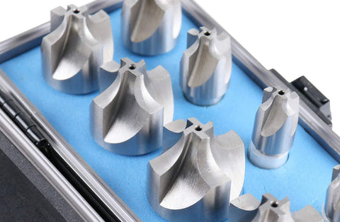 Close-up of eight HSS corner-rounding end mills in a blue foam case, sizes 1/16–3/8 in.