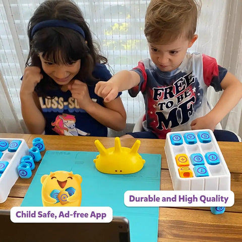 AR Powered Math Games Kit For Kids Ages Five To Seven With Numbers And Operators A Hands On Learning Toy That Turns Your Phone Or Tablet Into A Fun STEM Challenge With 250 Plus Levels And Story Based Puzzles Perfect Christmas Gift, two children playing with number tiles