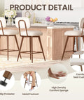 26 Inch Swivel Bar Stools Set Of 2 Beige PU Leather Counter Height Chairs With Low Back And Metal Legs next to a kitchen island.