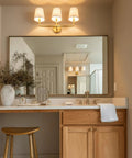 Bathroom with Dawson White Fabric Stay-Straight Shade Bath Vanity Light 3-Light Wall Mount in Aged Brass over mirror