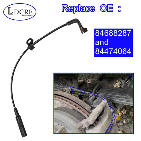 Rear disc brake pad wear sensor cable, black with plug end; installed on GM SUV brake caliper.