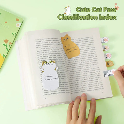 Cat Sticky Notes Set With Paw Tabs And Page Markers, 300 Sheets Of Cute Animal Divider Tabs in use on an open book.