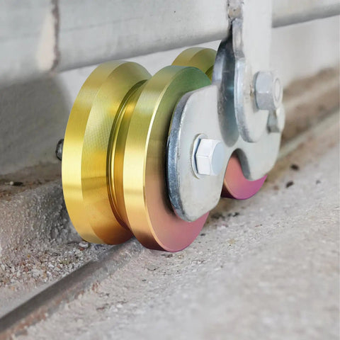 2 Sets Rock Solid 4 Inch V Groove Gate Roller Wheels Hardened Steel Double Ball Bearing 3000 lbs Capacity on concrete track.